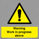 gender-neutral-construction-warning-sign-warning-work-in-progress-above-with-exc~